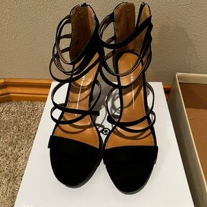 Lovely pair of heels, worn once. Perfect for a formal event.